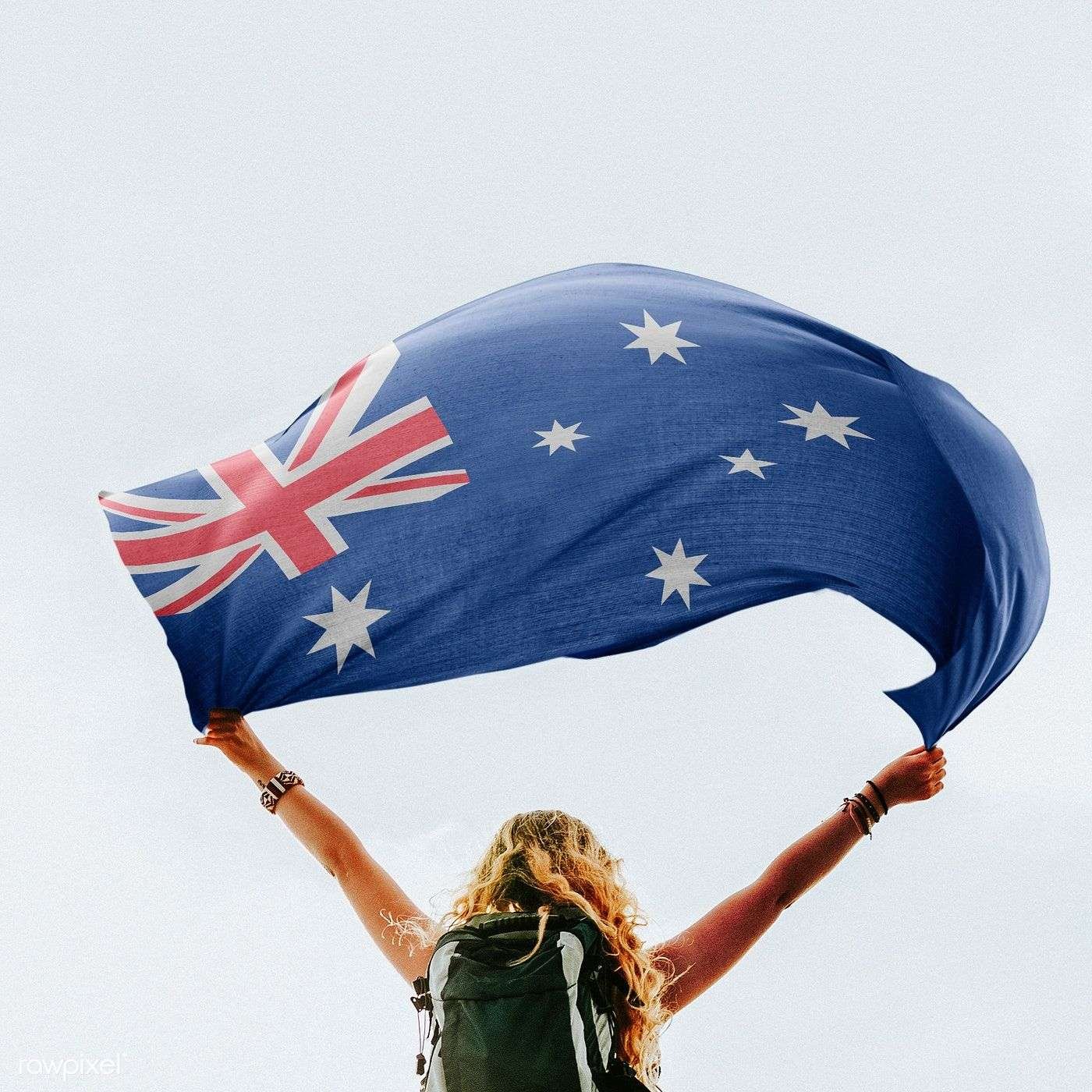 PERson holding a flag australian
