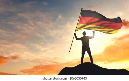 germany-flag-being-waved-by-260nw-1063030943